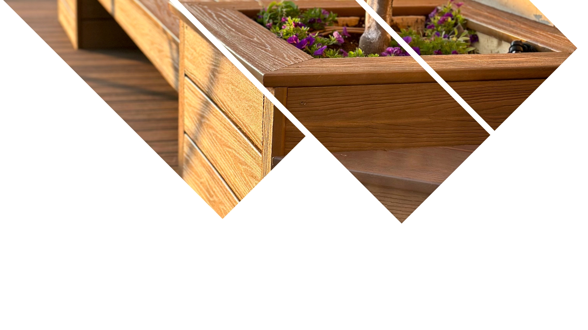 אדנית עם חיפוי עץ וצמחים ירוקים, מוצגת בעיצוב גיאומטרי, חתוך על דק עץ באור השמש. | DeckTech דקים, פרגולות ועבודות בנייה בעץ